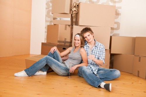 Professional mover carrying boxes for a Bethnal Green move