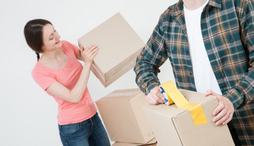 Professional movers in Bethnalgreen packing fragile household items