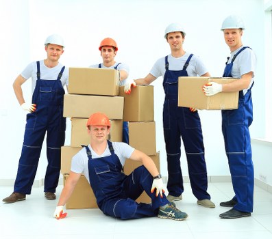 Loading furniture into a van for a Bethnal Green move