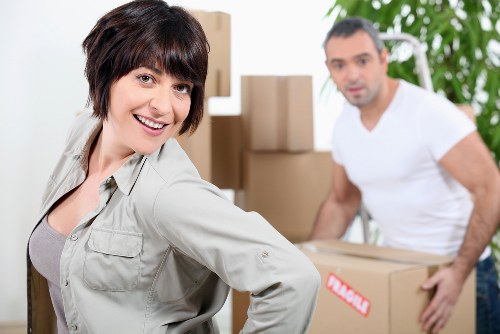 Local office move preparation with furniture and equipment arranged for transport