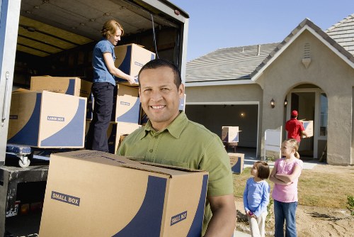 Office relocation service with boxes and equipment